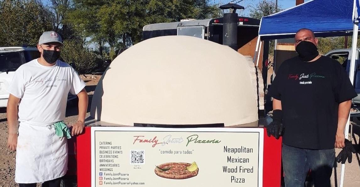 Cousins Leo and Vince outside of their mobile pizza oven